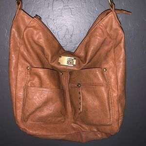 Roxy brown faux leather crossbody purse